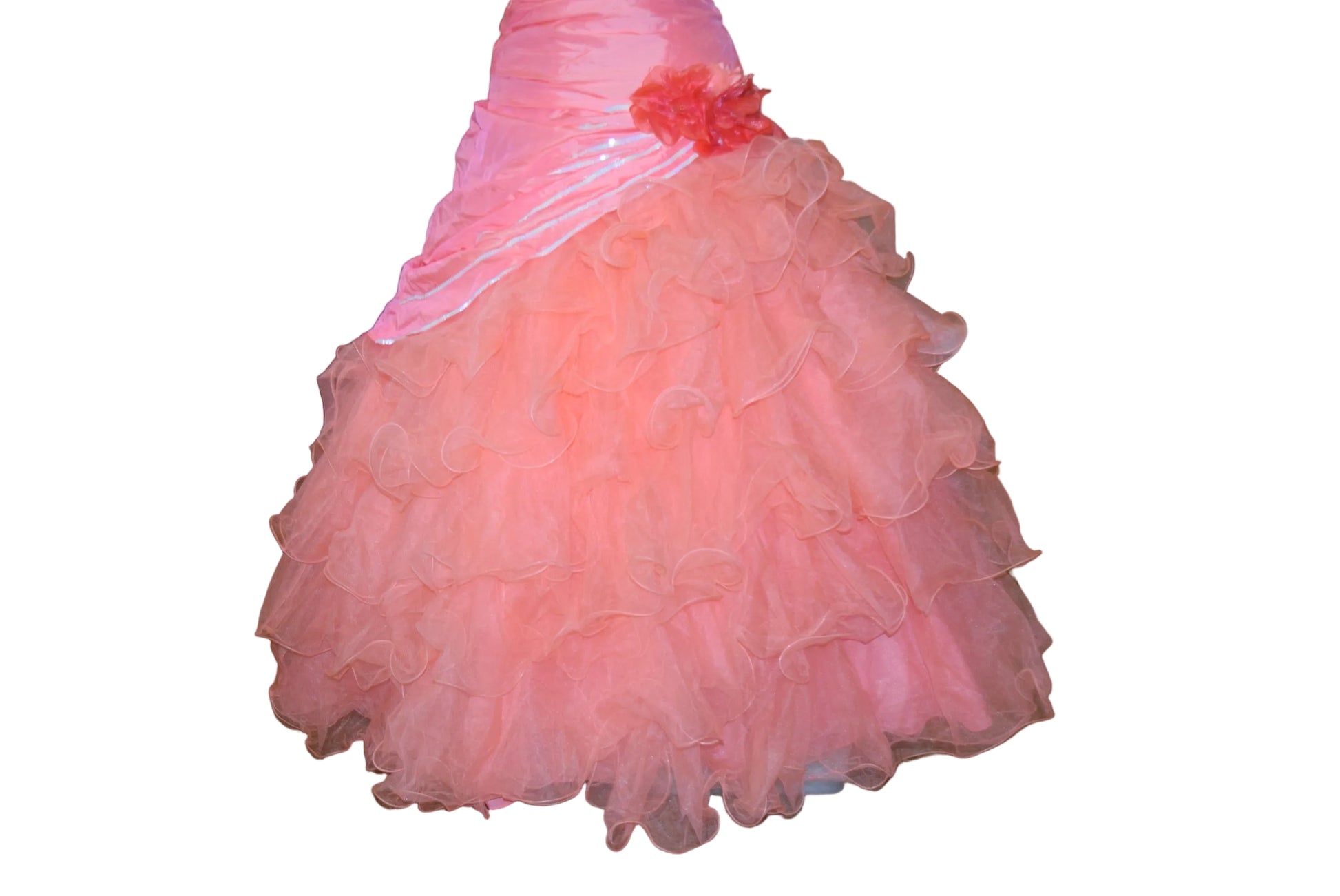 Pink ruffled dress on a kitchen floor