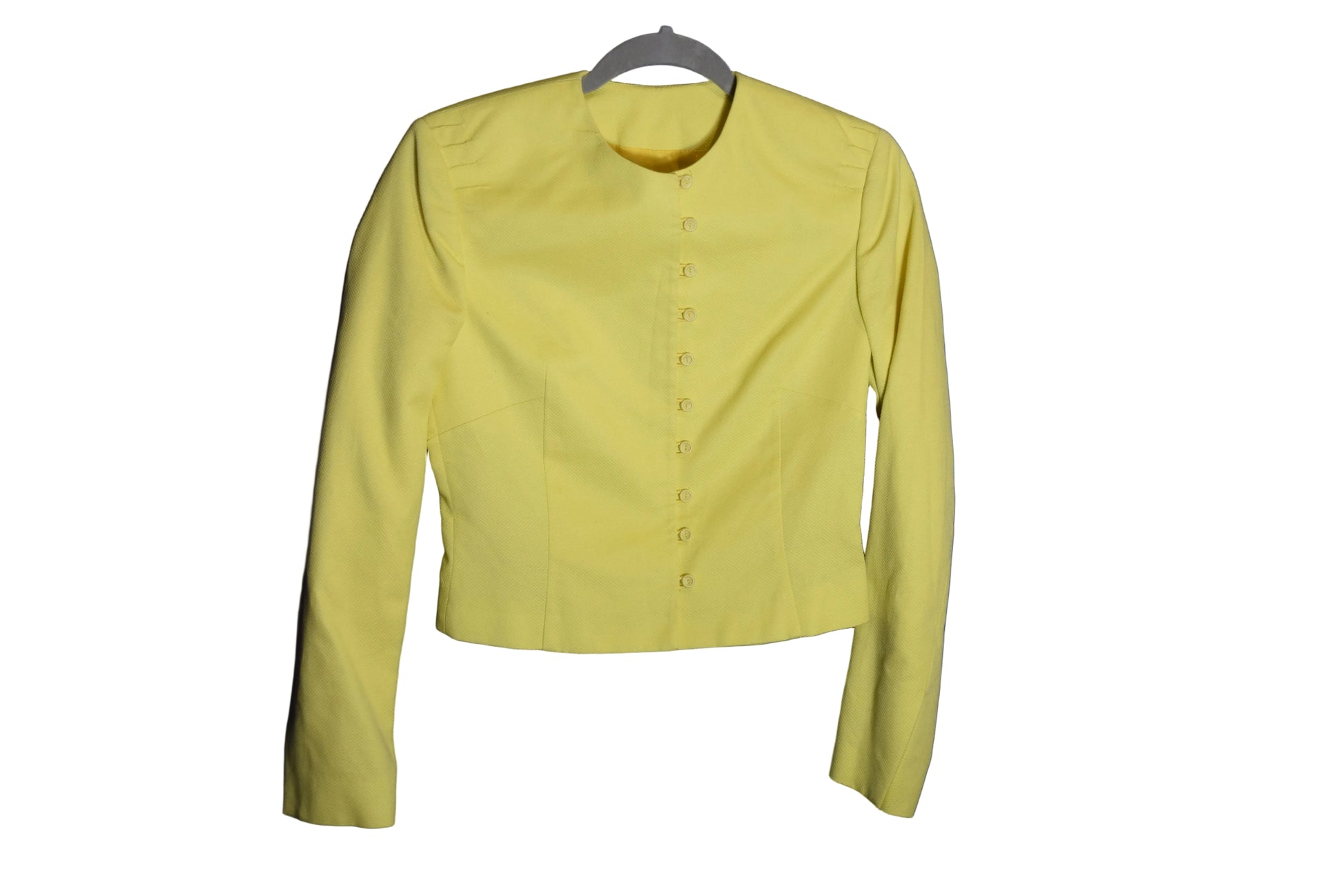 Decorative ceramic wall piece with a blue background