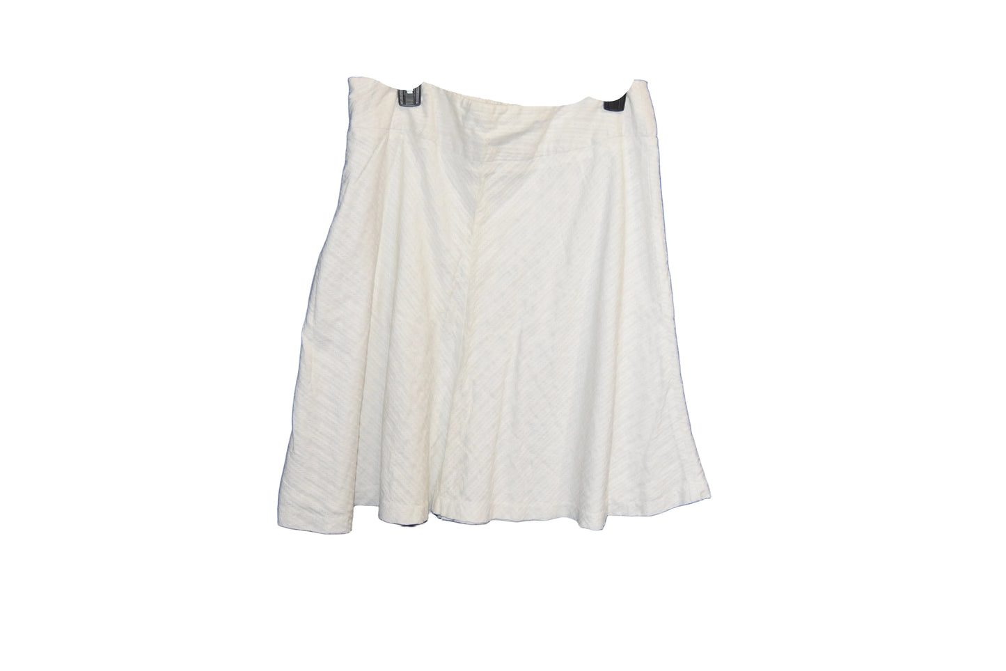 White skirt on a hanger against a blue background