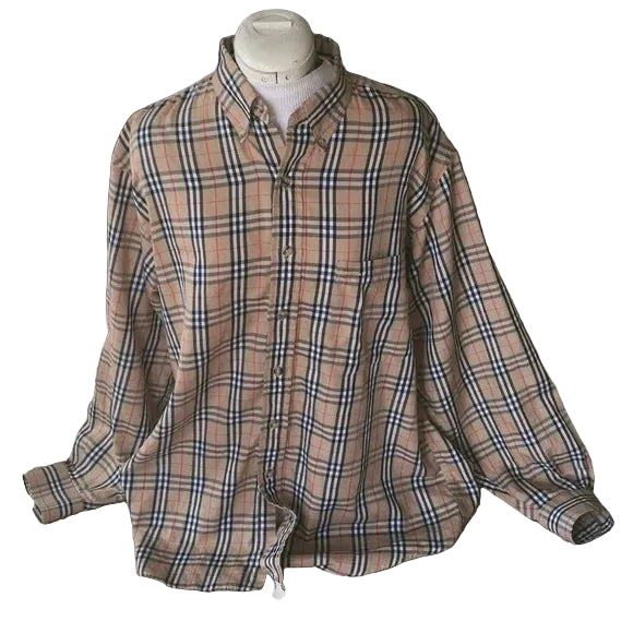 Plaid shirt on a mannequin against a neutral background